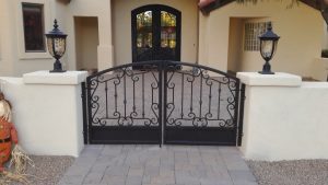 Ornate wrought iron gate for a home's courtyard.