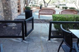 Restaurant patio fencing and gate secures a restaurant's outdoor patio.