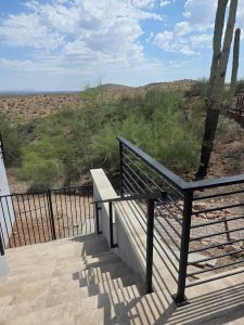 wrought iron railings on patio in desert landscape