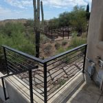 wrought iron railings on patio in desert landscape