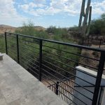 wrought iron railings on patio in desert landscape