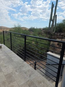 wrought iron railings on patio in desert landscape
