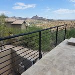wrought iron railings on patio in desert landscape