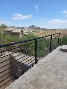 wrought iron railings on patio in desert landscape