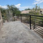 wrought iron railings on patio in desert landscape