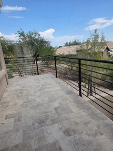 wrought iron railings on patio in desert landscape